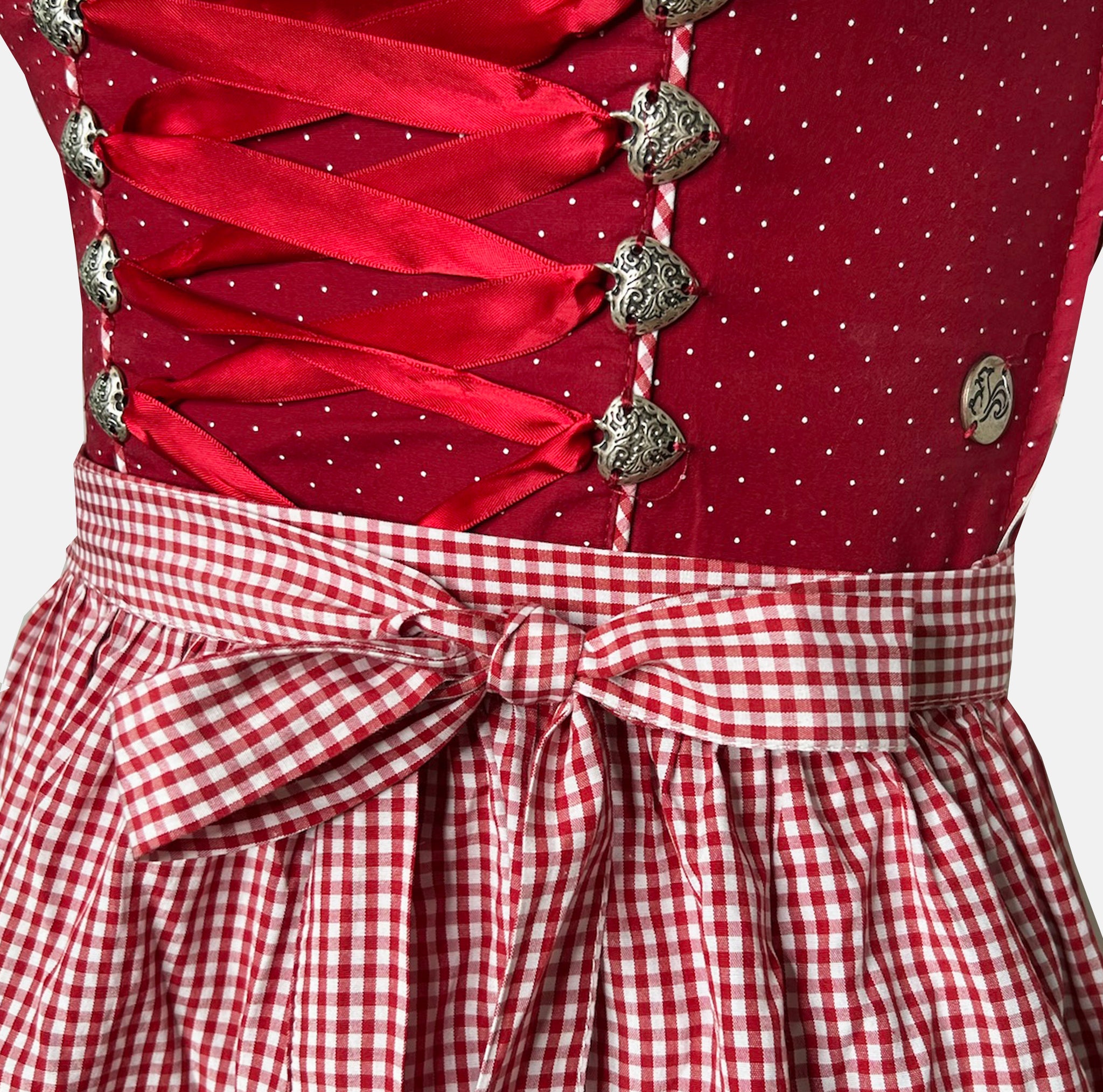Red Marjo Dirndl with polka dot bodice, gingham skirt, and floral embroidery, available for rent on Versatile OTM.