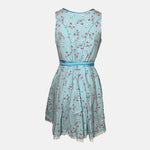 Marjo Bavarian rental dirndl in turquoise with floral embroidered bodice, lace-up detail, and satin apron, available at Versatile OTM in Munich.