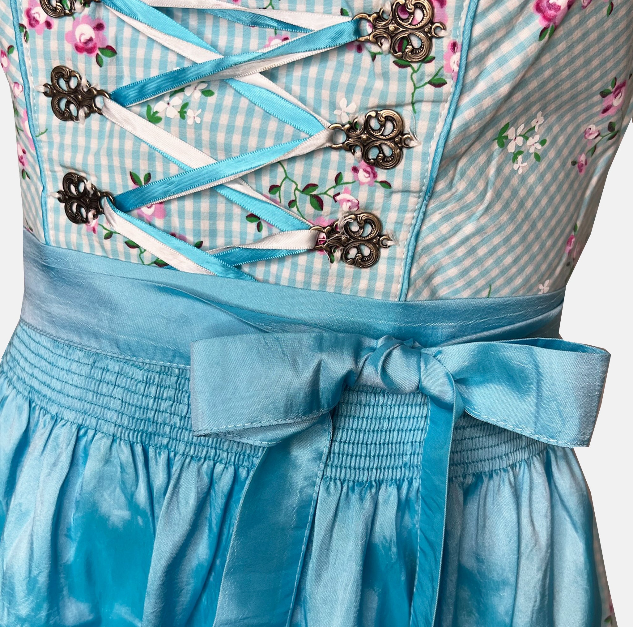 Marjo Bavarian rental dirndl in turquoise with floral embroidered bodice, lace-up detail, and satin apron, available at Versatile OTM in Munich.
