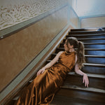 Stunning Reformation dress in coper for rent on Versatile 