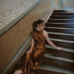 Stunning Reformation dress in coper for rent on Versatile 