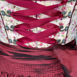 Affordable dirndl dress rental in Munich or online. Rent this stylish Krüger dirndl—perfect for Oktoberfest and events. Book your dirndl cheap today!