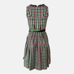 Rent a Bavarian dirndl dress in Munich with green checkered bodice and burgundy apron. Perfect Oktoberfest outfit rental at Versatile OTM.