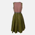Sportalm Dirndl with rose pink bodice, olive green accents, and lace apron, available to rent on Versatile OTM.