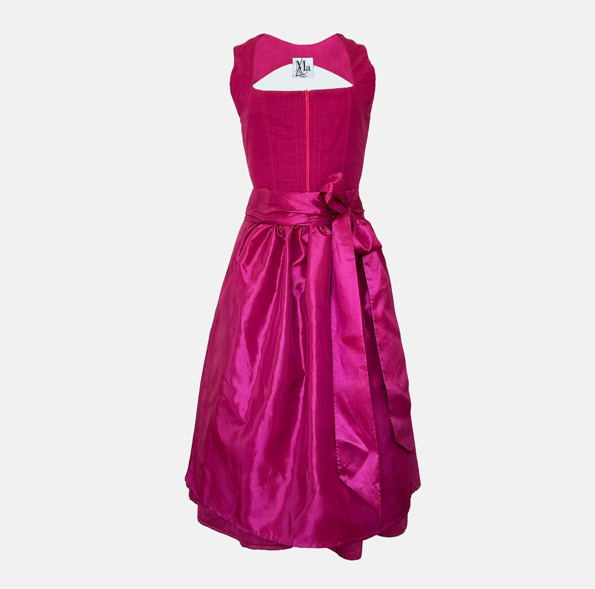 Ma.le.ma handmade dirndl rental via Versatile – vibrant fuchsia silk dirndl dress with bow apron, perfect for Oktoberfest in Munich