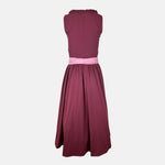 Exclusive Versatile Collection dirndl in berry with soft rose apron. Handmade in Germany, sustainable and fashion-forward. Rent a dirndl!
