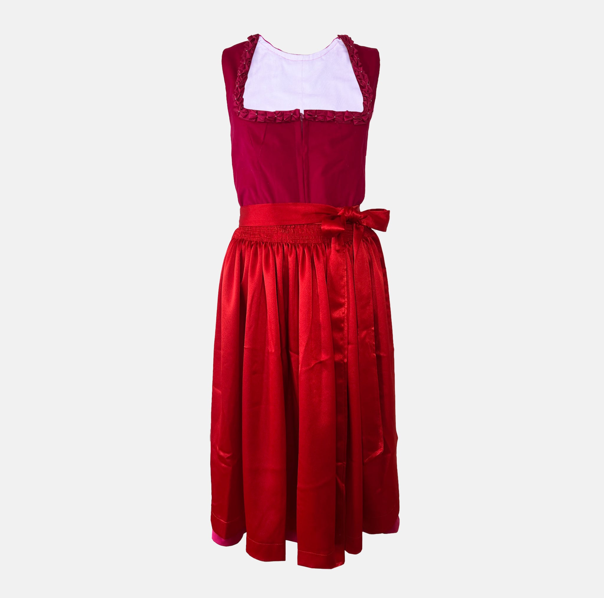 Elegant red Versatile Collection Dirndl with tone-on-tone design, handmade in Germany — perfect for Oktoberfest and available to rent at Versatile OTM.
