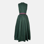 Rent this unique handmade green Versatile dirndl with a plum apron from our Munich collection. Perfect for Oktoberfest or elegant events. Available online or in-store.