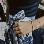 Rent Alpenherz Dirndl Marina in Munich: dark blue fitted bodice with sweetheart neckline and romantic tulle apron—Oktoberfest ready.