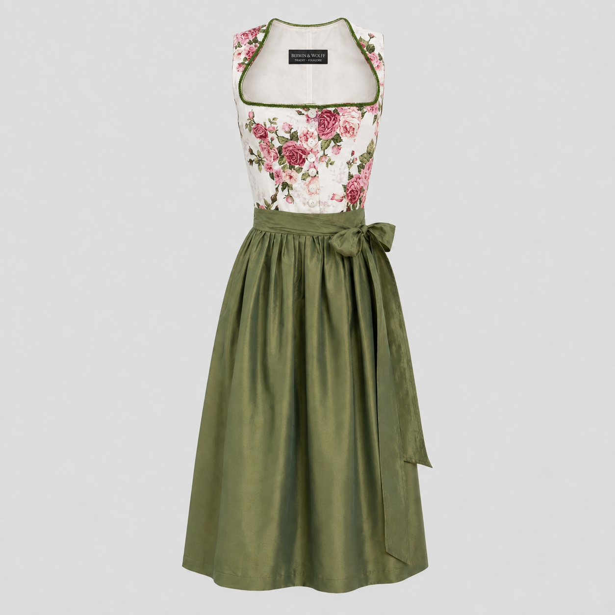 Front view of ivory Berwin & Wolff Dirndl with pink roses and green apron for Oktoberfest rental