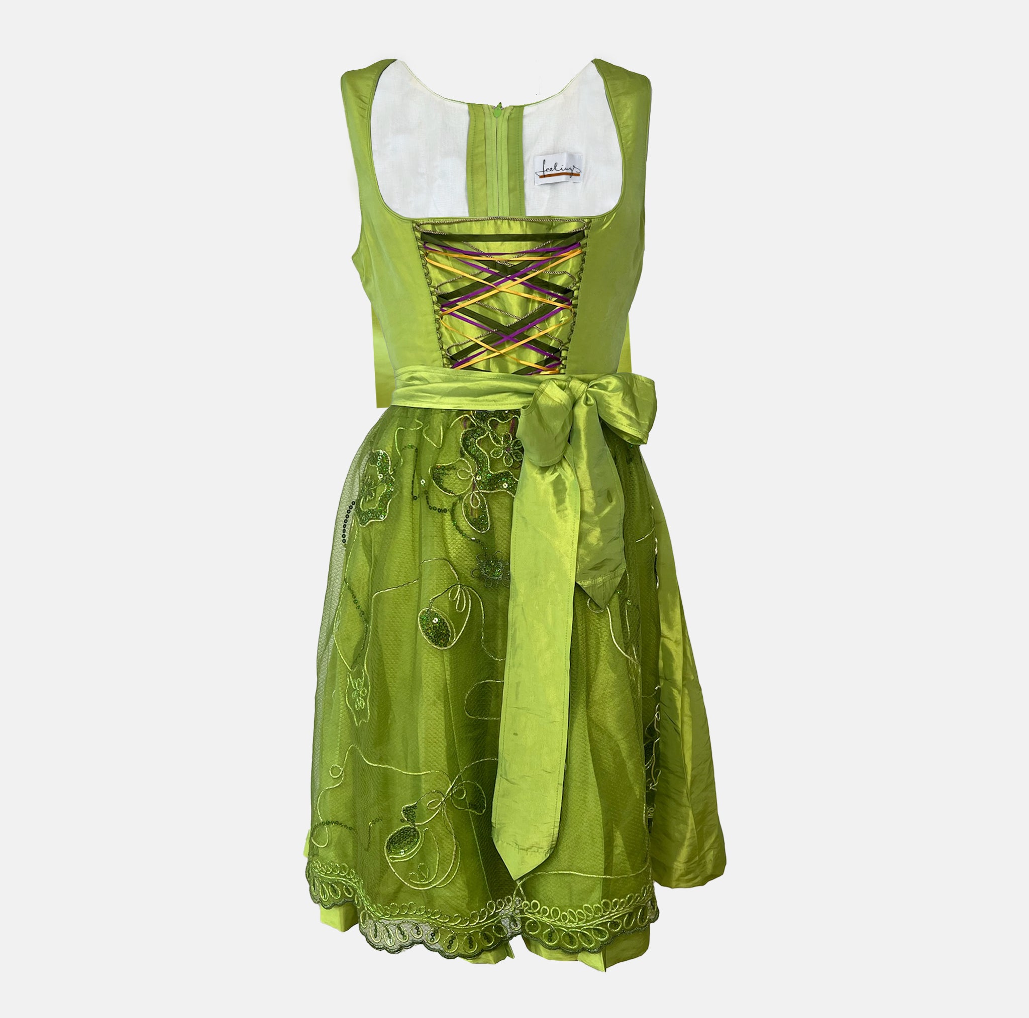 Lime-green Bavarian rental dirndl with colorful lace-up bodice and embroidered apron, available at Versatile OTM in Munich, owned by Beer&Pretzel Tours.