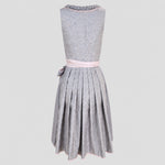 Back view of grey and pink Krüger Dirndl with patterned bodice and pleated skirt for Oktoberfest in Munich