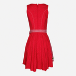 Back view of Krüger Mini Red Dirndl with white polka dots, back zip and red gingham apron ties
