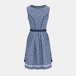 Back view of Marjo blue Dirndl with small white floral motifs, dark piping and white skirt trim